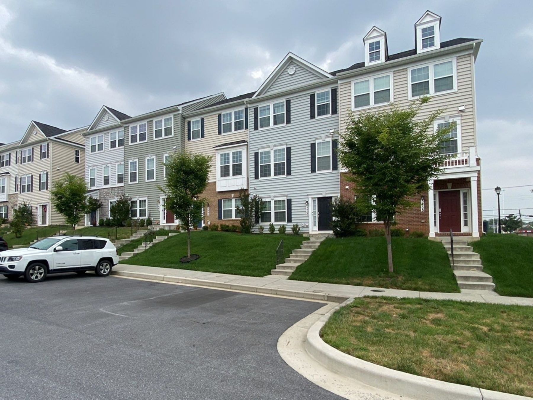 Townhomes in Baltimore, MD with white and gray front